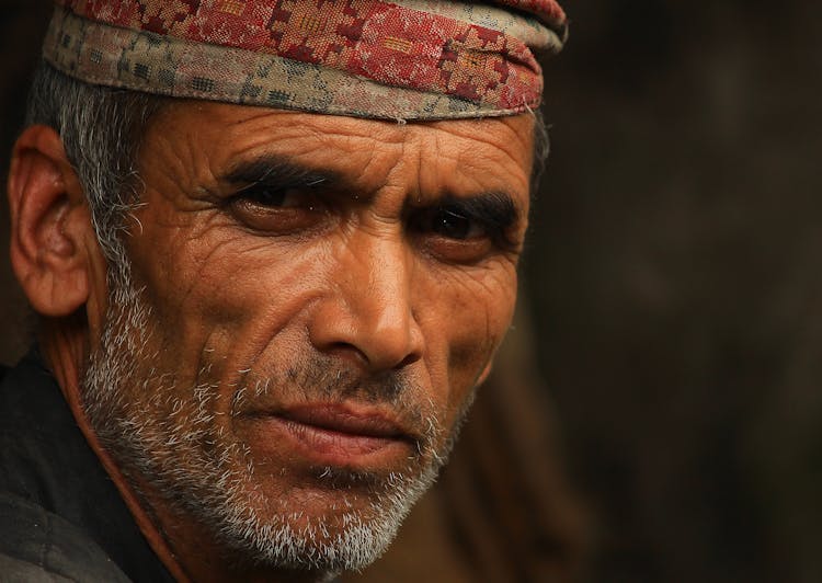 Close-Up Photo Of A Man With A Gray Beard