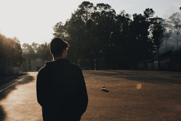 Teenage Boy On The Playing Field