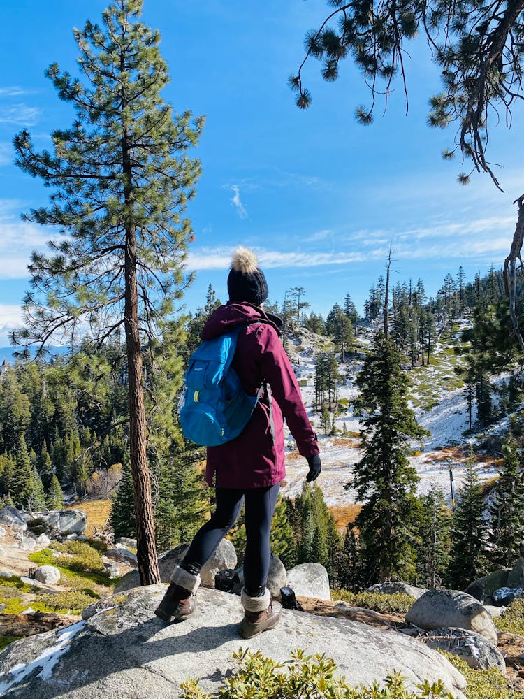 A Woman With A Backpack