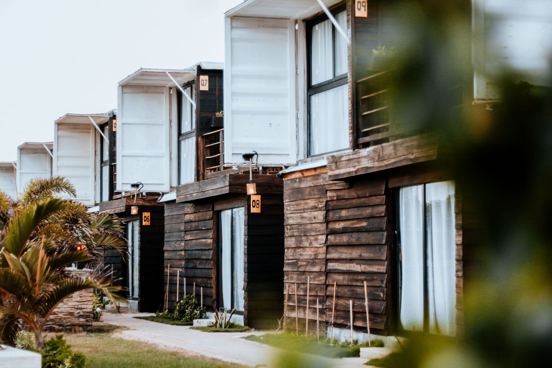 Charming wooden cottages at a resort in Adicora, Venezuela, showcasing modern architectural design. Related image for Sustainability: Trends Shaping Hotels in 2026.