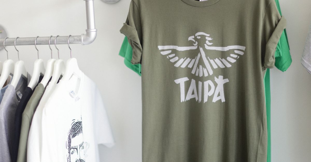 Representative casual tops on a clothing rail