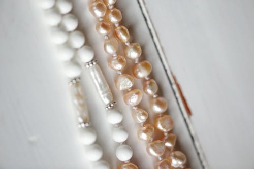 Pearl Accessories on White Surface