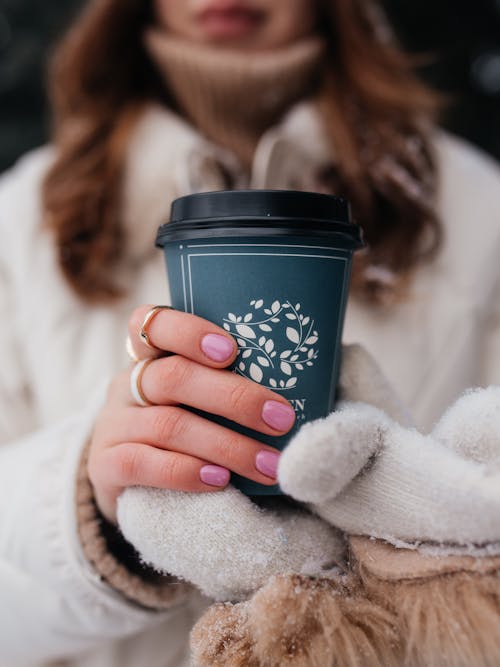 Close-up View of Woman Holding Coffee Cup