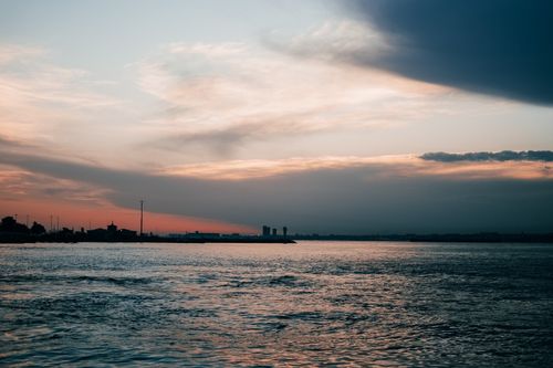 Free Beautiful sunset over the Bosphorus Strait in Istanbul with colorful sky and tranquil water view. Stock Photo