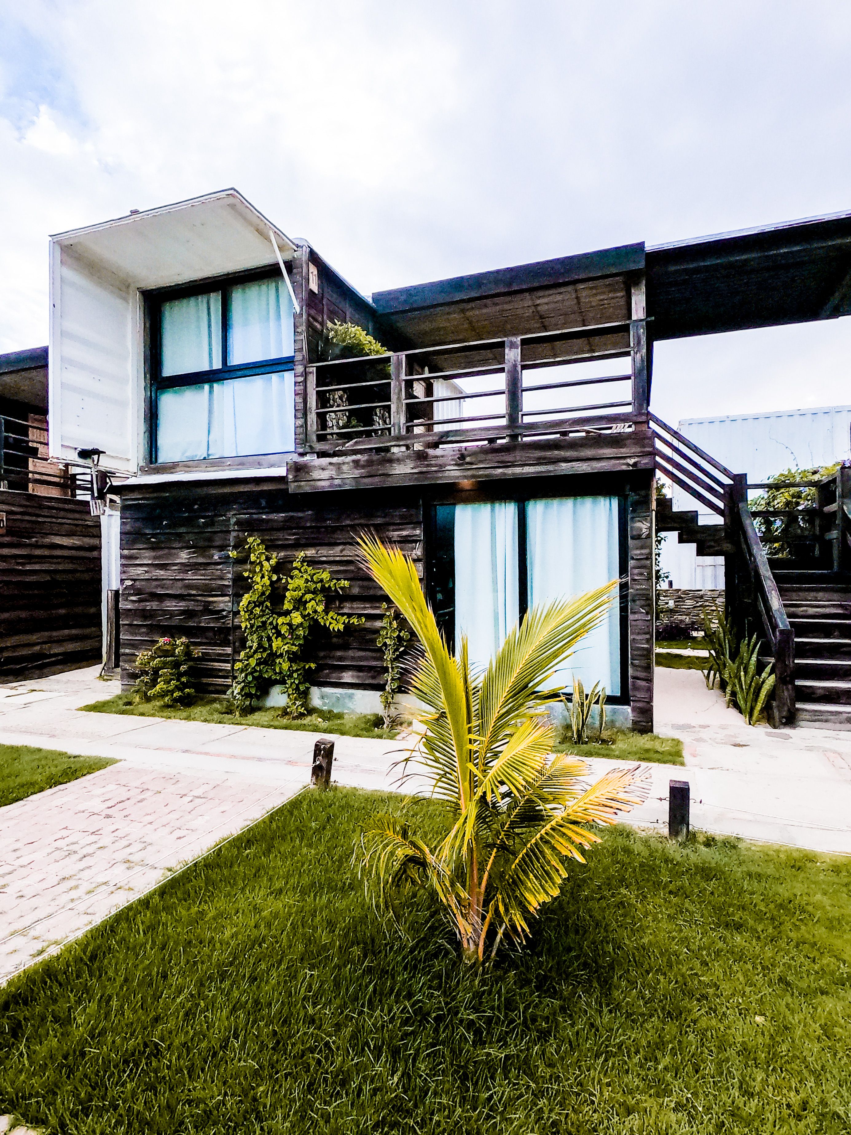 Brown Wooden House in the Middle of Grass Field · Free Stock Photo
