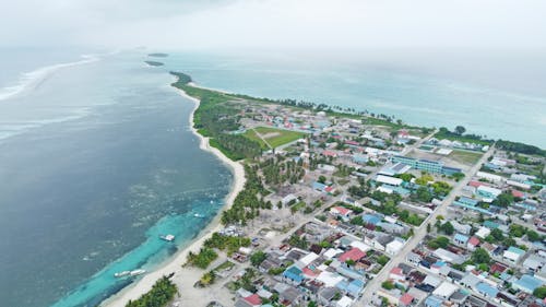 Free Aerial Shot of a Coastal City Stock Photo