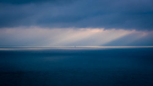 Seascape Under Cloudy Sky 