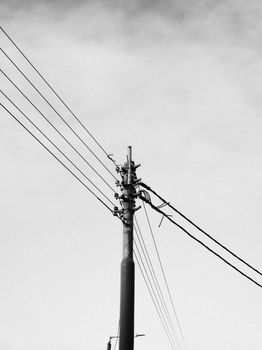 Black Electric Post Under White Sky