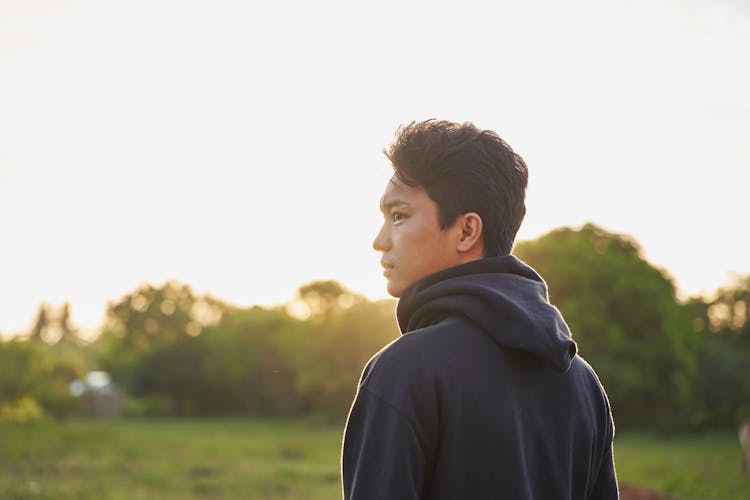 A Man In Black Hoodie 