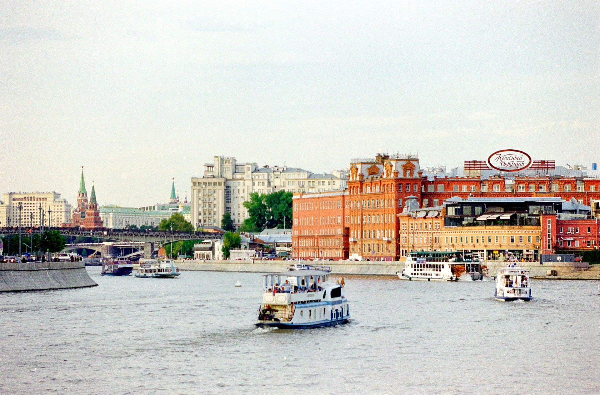 Ferries on the River with a View of the Krasny Oktyabr Factory in Moscow, Russia
