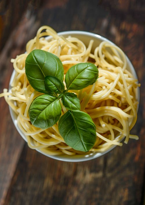 Green Leafed Plant on Pasta