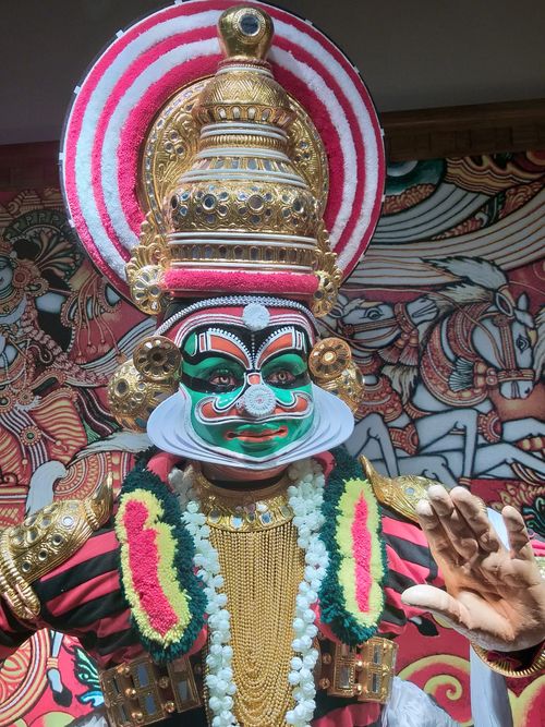 Free Intricate Kathakali mask and costume showcasing traditional cultural art from Kerala, India. Stock Photo
