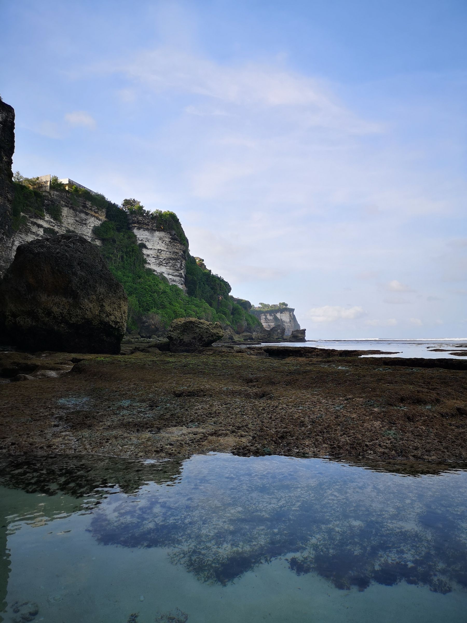 Uluwatu's limestone cliffs, tidal pools, and Indian Ocean coast in South Bali