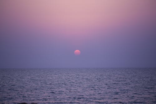 Бесплатное стоковое фото с восход, закат, морская вода