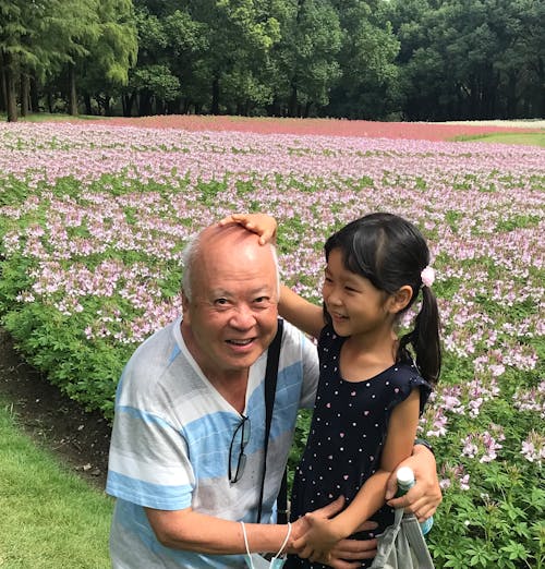 Little Girl and Grandpa Smiling 