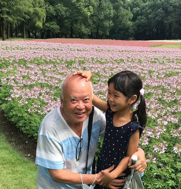 Little Girl And Grandpa Smiling 