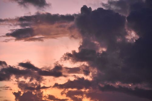 Free Captivating cumulus clouds at sunset in Odisha, India, creating a dramatic sky. Stock Photo