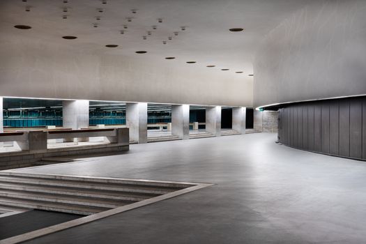 Spacious, minimalist interior of an empty concert hall in Tallinn.