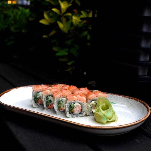Sushi on White Ceramic Plate