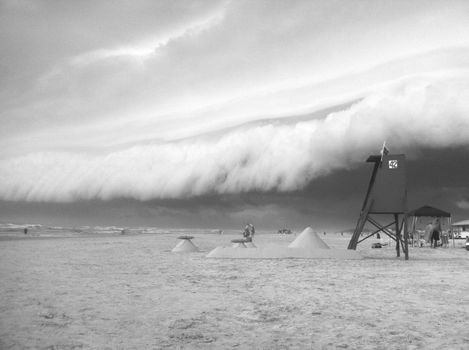 
A Grayscale of a Beach with an Incoming Dust Storm