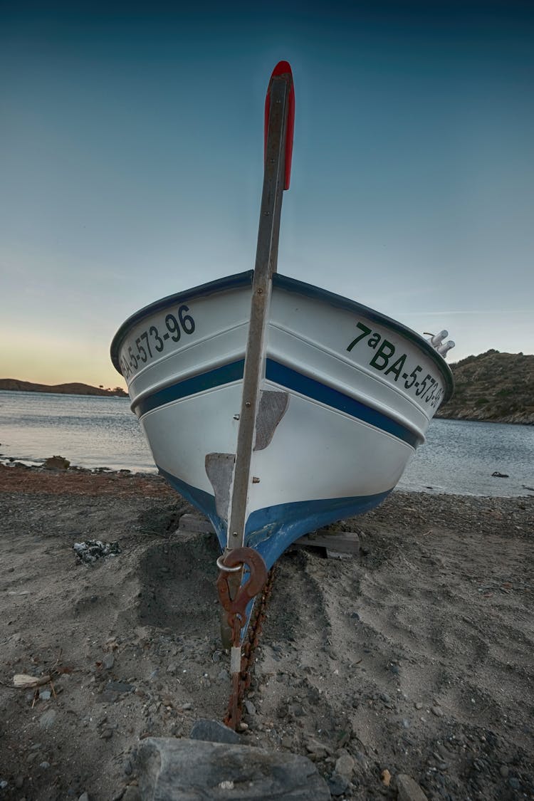 A Boat Parked Beside The Beach