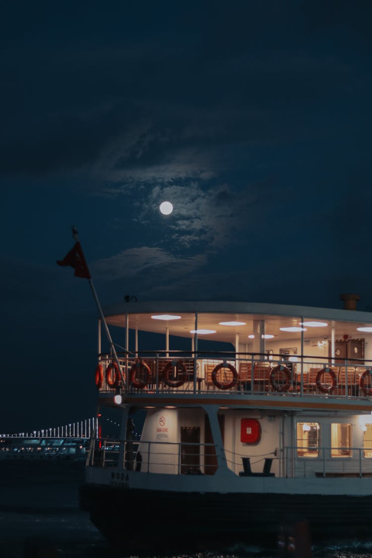 A Ferry Boat  On Sea At Night