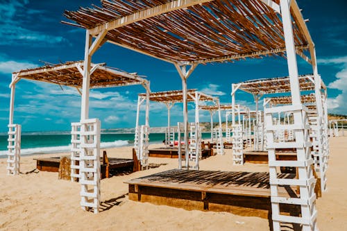 Beds on Sunshades in the Beach
