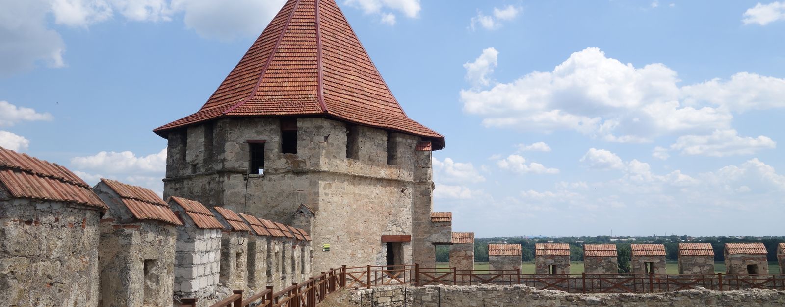 Scenic view of Bendery Fortress, a notable historical site in Bender, Moldova, under a clear blue sky.