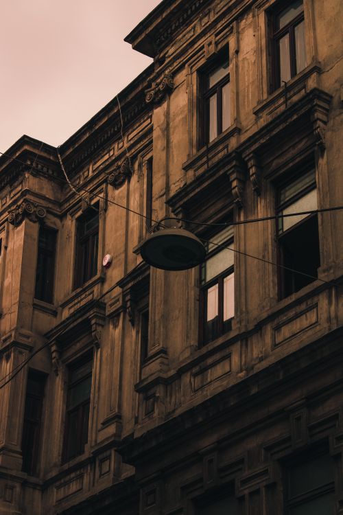 Free A detailed view of a classic old building facade in Istanbul, showcasing intricate architectural designs. Stock Photo