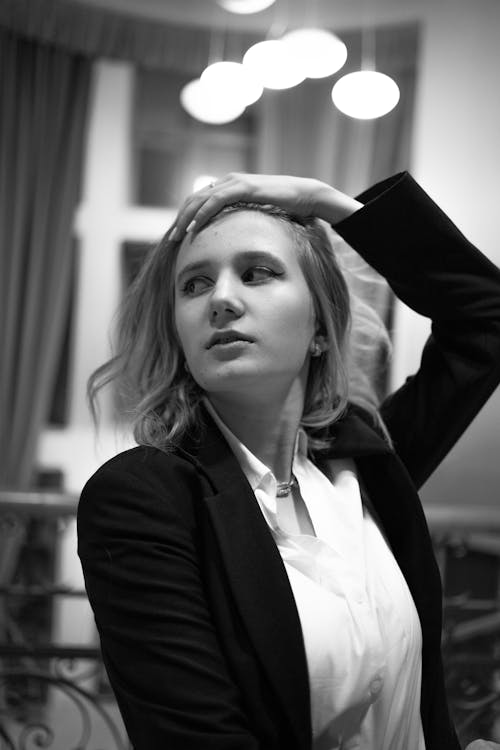 Free 

A Grayscale of a Woman in a Blazer Stock Photo