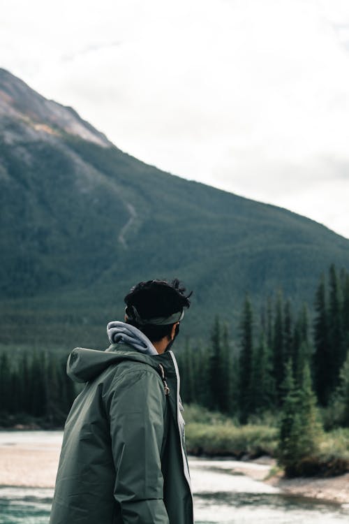 A Man in Gray Jacket in an Outdoor Adventure