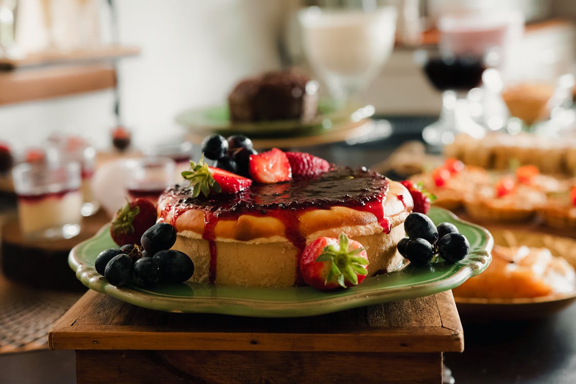 Free Cheesecake with Jam and Fruits Stock Photo