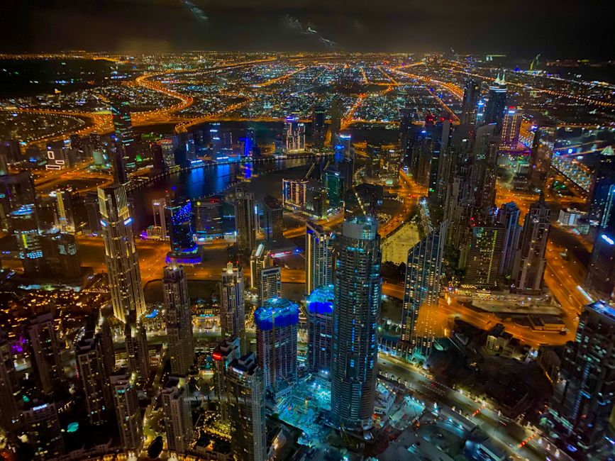 Unforgettable 12 Minute Helicopter Ride in Dubai with Optional Transfer Review Review 2026 - A mesmerizing aerial view of Dubai's illuminated skyline and cityscape at night.