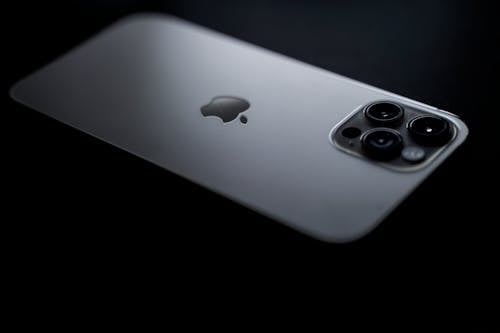 Free Silver Iphone on Black Surface Stock Photo