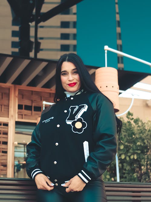 A Woman with Red Lips Wearing Jacket