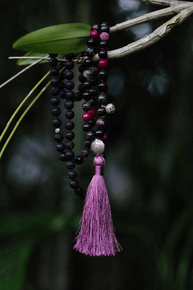 Selective Focus Of Mala Necklace Hanging From The Branch