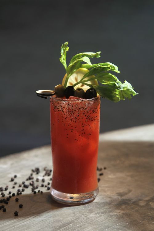 Free A classic Bloody Mary cocktail served with celery and olives, perfect for brunch. Stock Photo
