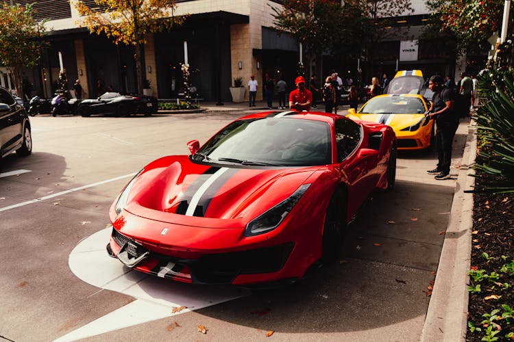 Red Ferrari Sports Car On Road