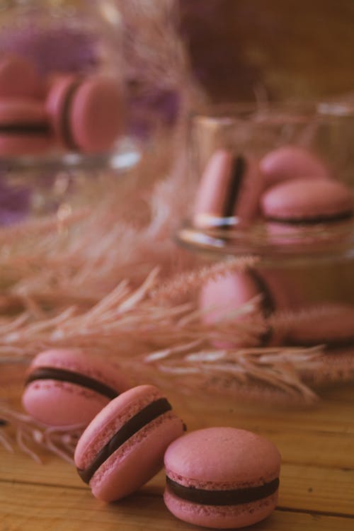 Pink Macarons on Wooden Table