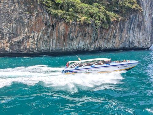 Free Speedboat Cruising at the Coast Stock Photo