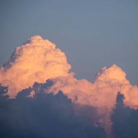 Sunlit pink clouds at dusk — photo by sadis on Pexels