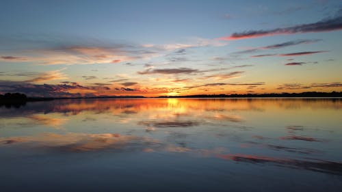 Body of Water Under a Dramatic Sky