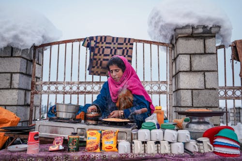 Woman Cooking in Winter