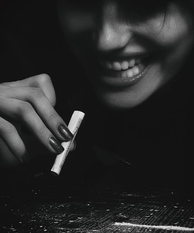Woman Holding a Blunt