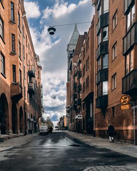 Explore Malmö's urban charm with residential facades and cobblestone streets.