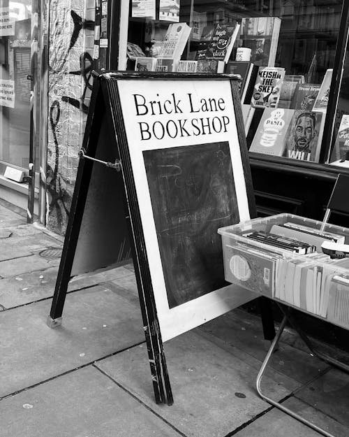 Free Grayscale Photography of Book Shop Stock Photo