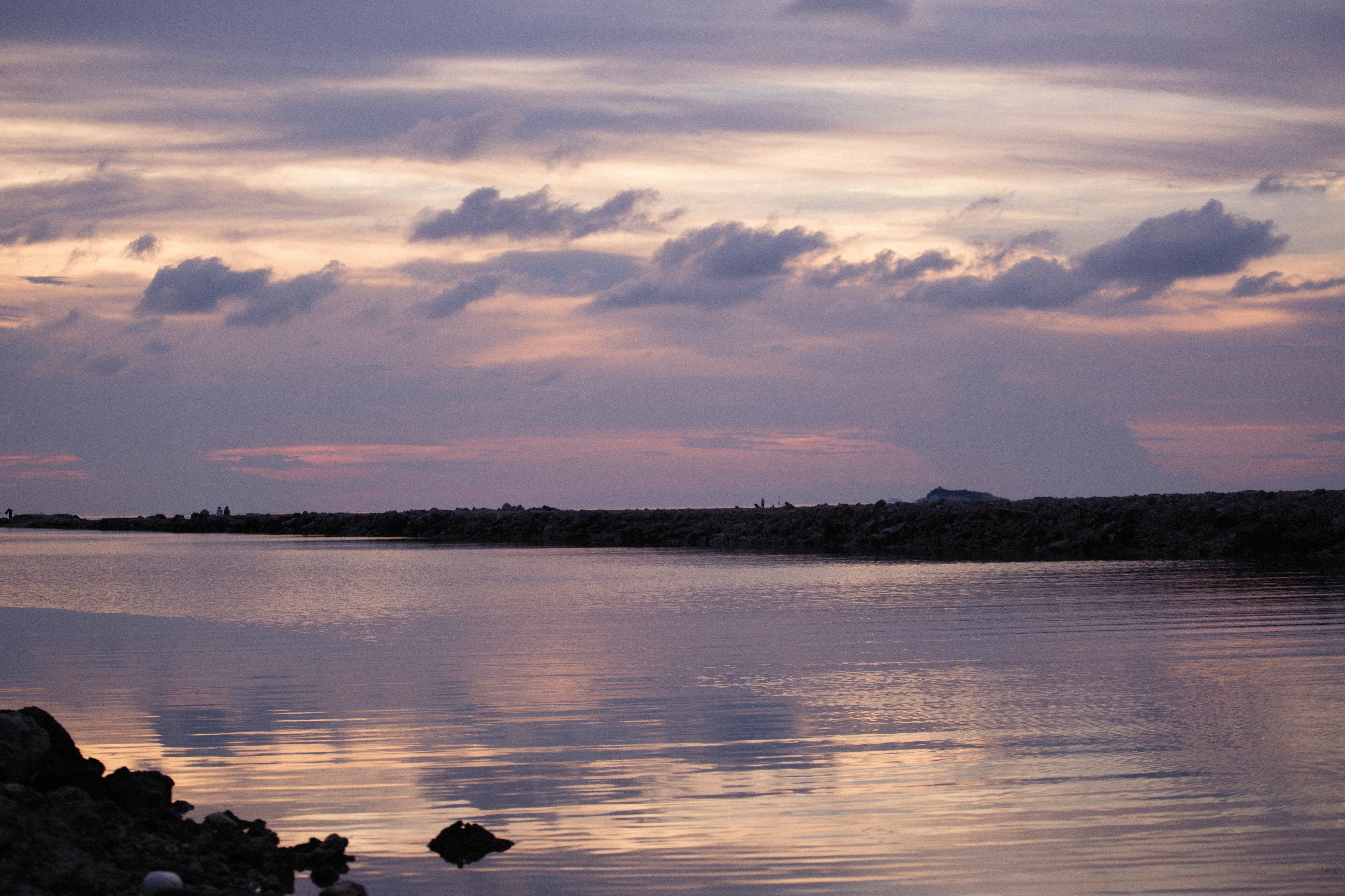 Light Purple Sunset Sky Over a River · Free Stock Photo