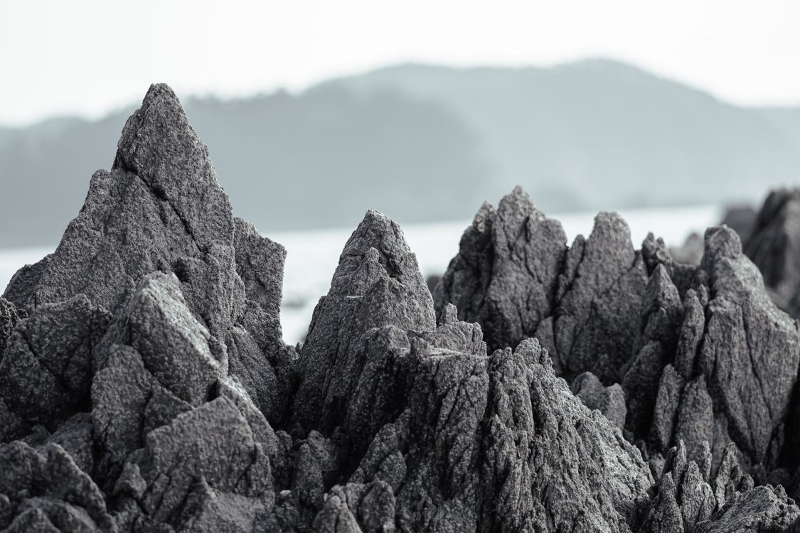 Gray Rock Formations Near the Ocean · Free Stock Photo
