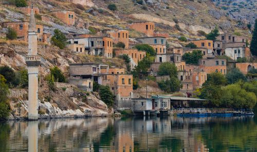 Free Photo of a sunken village and minaret reflecting in a lake in Halfeti, Turkey. A blend of nature and historical architecture. Stock Photo