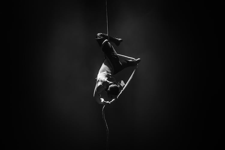 Person Swinging On Rope